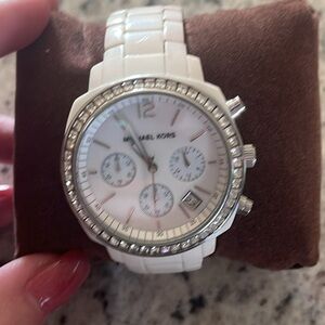 White Michael Kors watch. Used with box and manual.